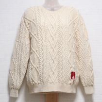 生成ロゴ入り模様編みセーター