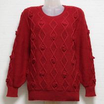 赤モチーフ付き模様編みセーター