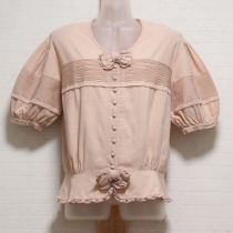 ピンクリボン付きペプラムブラウス