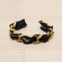 ゴールド×黒通しロゴリボンバングル